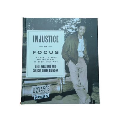 Injustice In Focus Matte Laminated Hardcover Art Book With Smyth Sewn Binding And 4C/4C Glossy Art Paper Inner Pages
